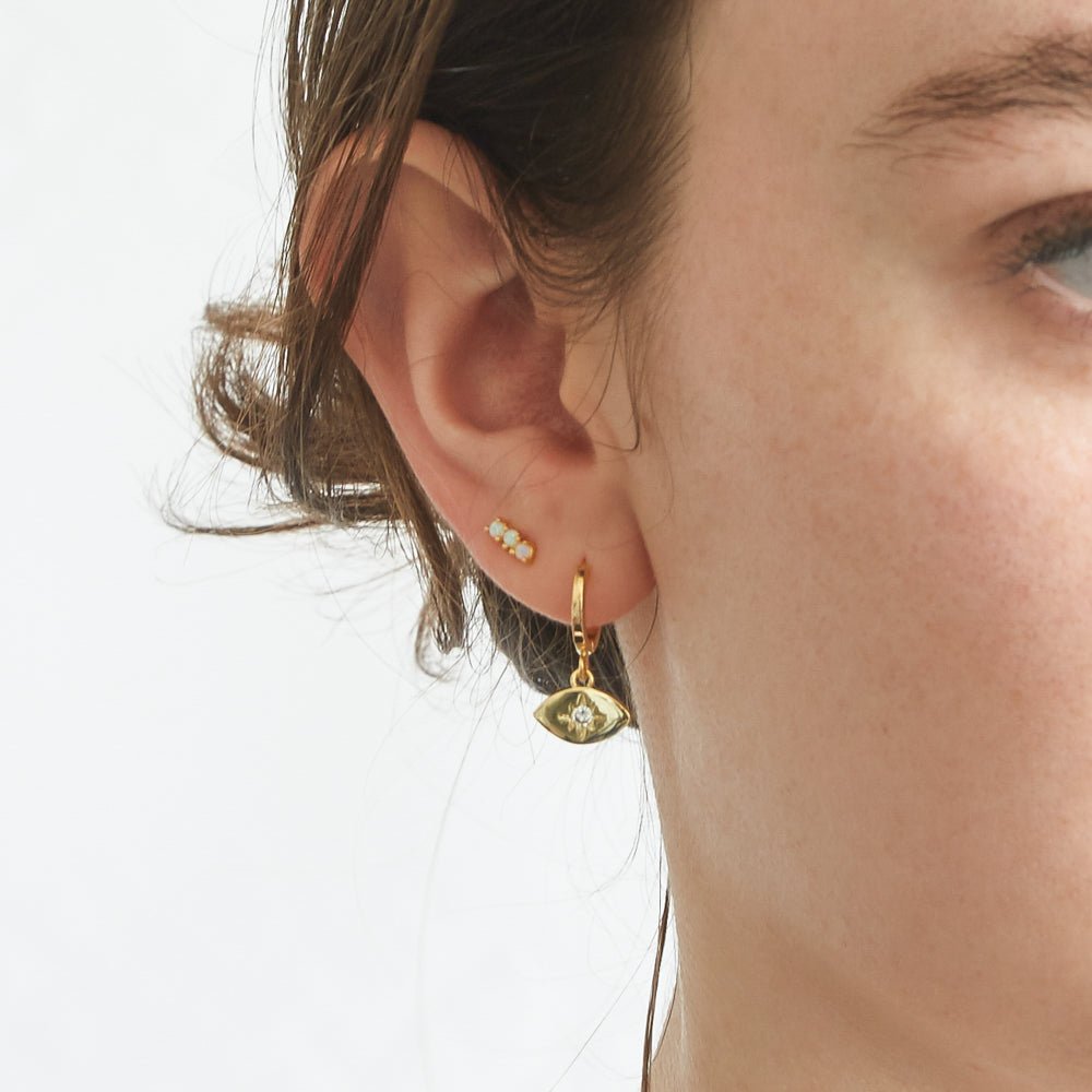 CZ Gold Eye Huggie Earrings Admiral Row